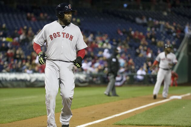 Boston Red Sox David Ortiz scores on the single by Shane Victorino during the third inning of a baseball game against the Philadelphia Phillies, Thursday, April 9, 2015, in Philadelphia. (AP Photo/Chris Szagola)