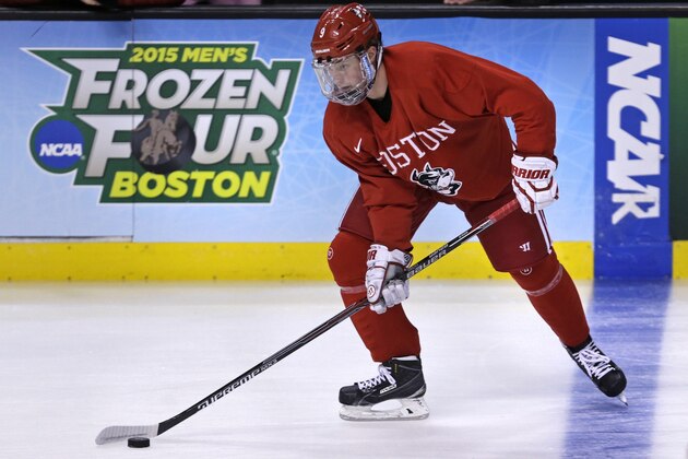 Boston University forward Jack Eichel sets to pass during an NCAA hockey practice before the Frozen Four tournament in Boston, Wednesday, April 8, 2015.  (AP Photo/Charles Krupa)