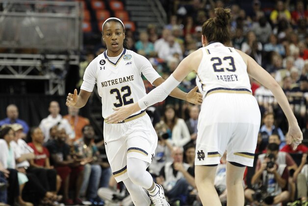 Apr 5, 2015; Tampa, FL, USA; Notre Dame Fighting Irish guard Jewell Loyd (32) reacts with guard Michaela Mabrey (23) during the first half of a 2015 NCAA Women's Division I Championship semi-final game against the South Carolina Gamecocks at Amalie Arena. Mandatory Credit: Kim Klement-USA TODAY Sports