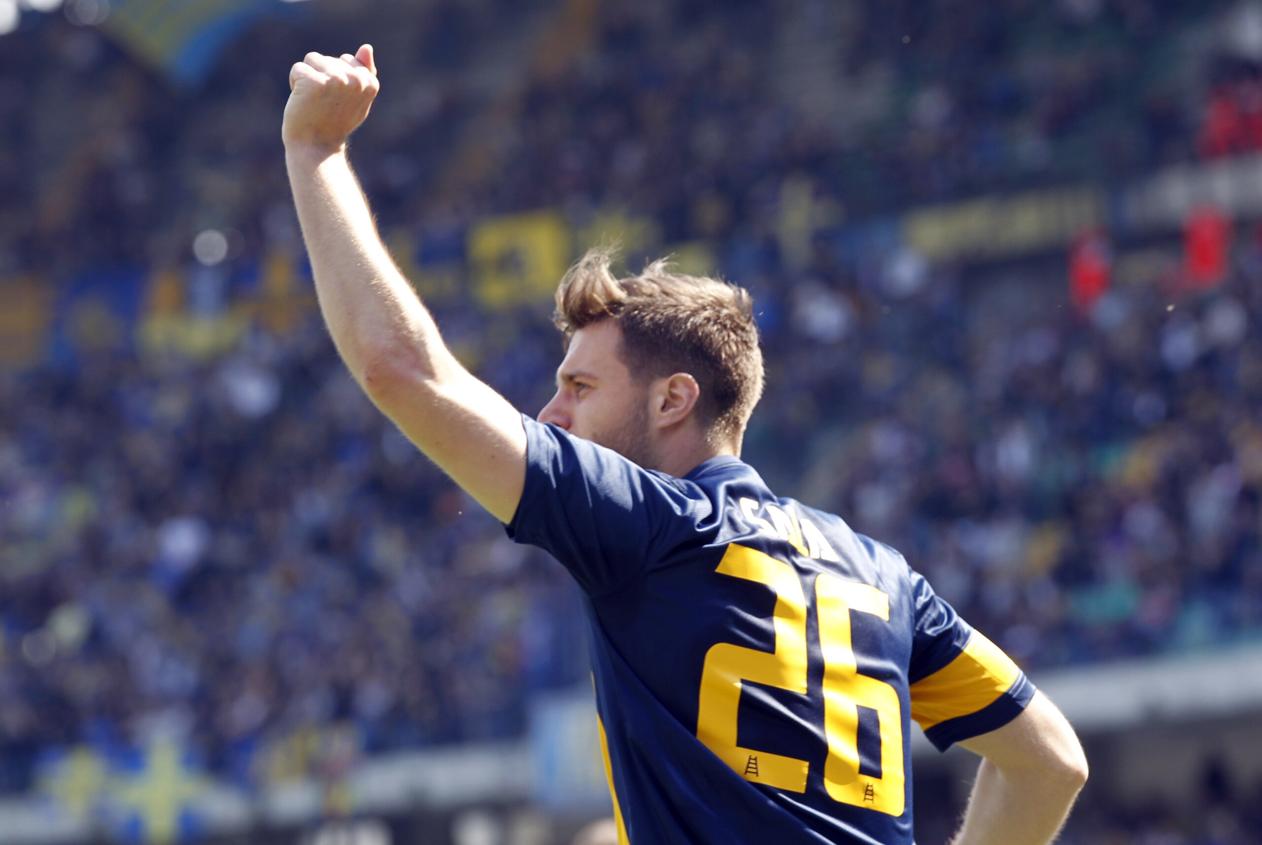 Hellas Verona's Jacopo Sala celebrates after scoring during a Serie A soccer match against Fiorentina at Bentegodi stadium in Verona, Italy, Sunday, April 13, 2014. (AP Photo/Felice Calabro')