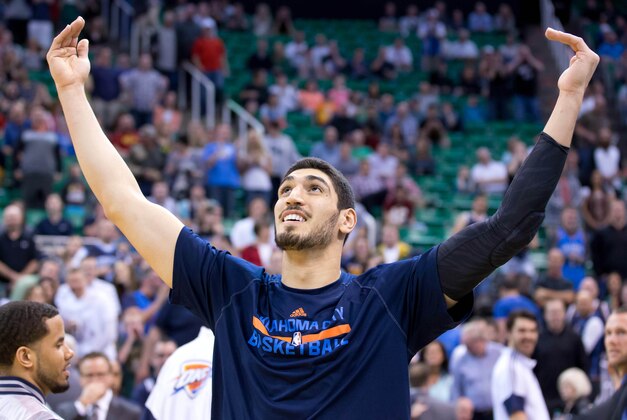 Mar 28, 2015; Salt Lake City, UT, USA; Oklahoma City Thunder center Enes Kanter (34) reacts to being booed by Utah Jazz fans during his introduction prior to the game at EnergySolutions Arena. The Jazz won 94-89. Mandatory Credit: Russ Isabella-USA TODAY Sports