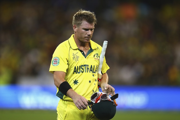 MELBOURNE, AUSTRALIA - MARCH 29:  David Warner of Australia looks dejected after being dismissed by Matt Henry of New Zealand during the 2015 ICC Cricket World Cup final match between Australia and New Zealand at Melbourne Cricket Ground on March 29, 2015 in Melbourne, Australia.  (Photo by Ryan Pierse/Getty Images)