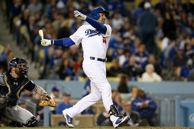 LOS ANGELES, CA - APRIL 08:  Adrian Gonzalez #23 of the Los Angeles Dodgers hits his second home run of the game, a solo shot in the third inning against the San Diego Padres at Dodger Stadium on April 8, 2015 in Los Angeles, California.  (Photo by Stephen Dunn/Getty Images)