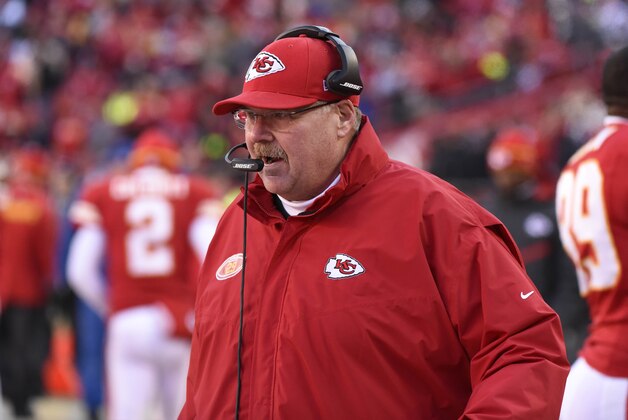Kansas City Chiefs head coach Andy Reid follows from the sideline during the second half of an NFL football game against the San Diego Chargers in Kansas City, Mo., Sunday, Dec. 28, 2014. (AP Photo/Ed Zurga)
