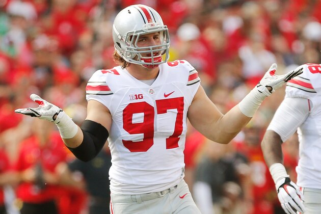 COLLEGE PARK, MD - OCTOBER 04:  Defensive end Joey Bosa #97 of the Ohio State Buckeyes celebrates after one of his first-half sacks against the Maryland Terrapins at Byrd Stadium on October 4, 2014 in College Park, Maryland. Also pictured is teammate Steve Miller #88. (Photo by Jonathan Ernst/Getty Images)