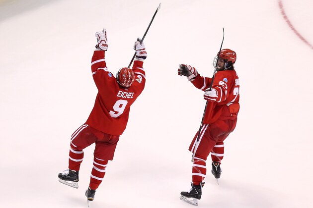 BOSTON, MA - APRIL 09: Jack Eichel #9 of the Boston Terriers celebrates scoring his team's fifth goal and his second of the game in the third period against North Dakota during the 2015 NCAA Division I Men's Hockey Championship semifinals at TD Garden on April 9, 2015 in Boston, Massachusetts.  (Photo by Mike Lawrie/Getty Images)