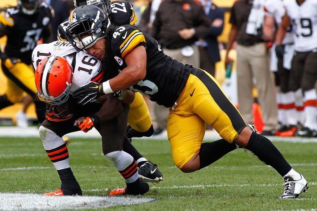 PITTSBURGH, PA - SEPTEMBER 7:  Troy Polamalu #43 of the Pittsburgh Steelers has his helmet knocked off while tackling Andrew Hawkins #16 of the Cleveland Browns during the fourth quarter at Heinz Field on September 7, 2014 in Pittsburgh, Pennsylvania.  (Photo by Justin K. Aller/Getty Images)