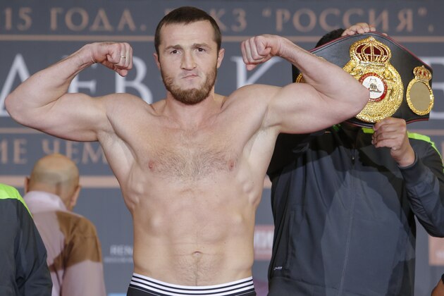 Russian boxer Denis Lebedev poses for photo with his WBA belt, during the weigh-in session in Moscow, Russia, Thursday, April, 9, 2015. Denis Lebedev of Russia will fight for light heavyweight WBA title against Youri Kalenga of France in Moscow on Friday. (AP Photo/Denis Tyrin)