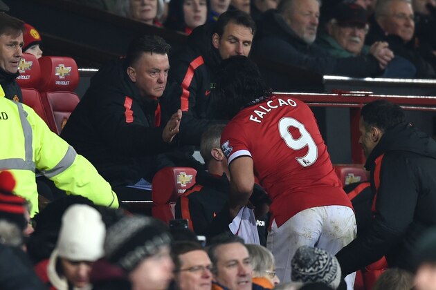 MANCHESTER, ENGLAND - FEBRUARY 11:  Louis van Gaal, manager of Manchester United shakes hands with Radamel Falcao after he was substituted during the Barclays Premier League match between Manchester United and Burnley at Old Trafford on February 11, 2015 in Manchester, England.  (Photo by Michael Regan/Getty Images)