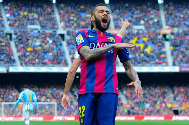 BARCELONA, SPAIN - FEBRUARY 21:  Dani Alves of FC Barcelona reacts during the La Liga match between FC Barcelona and Malaga CF at Camp Nou on February 21, 2015 in Barcelona, Spain.  (Photo by David Ramos/Getty Images)