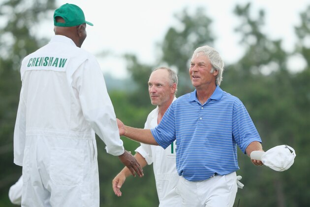 AUGUSTA, GA - APRIL 10:  Ben Crenshaw of the United States greets his longtime caddie Carl Jackson on the 18th green after playing his final Masters during the second round of the 2015 Masters Tournament at Augusta National Golf Club on April 10, 2015 in Augusta, Georgia.  (Photo by Andrew Redington/Getty Images)