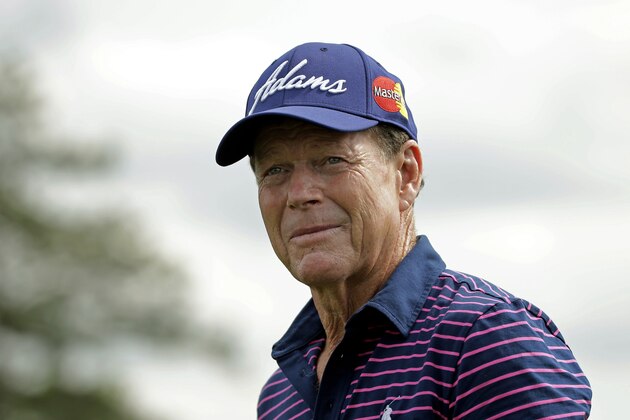 Tom Watson walks off the 18th green after his second round of the Masters golf tournament Friday, April 10, 2015, in Augusta, Ga. (AP Photo/Matt Slocum)