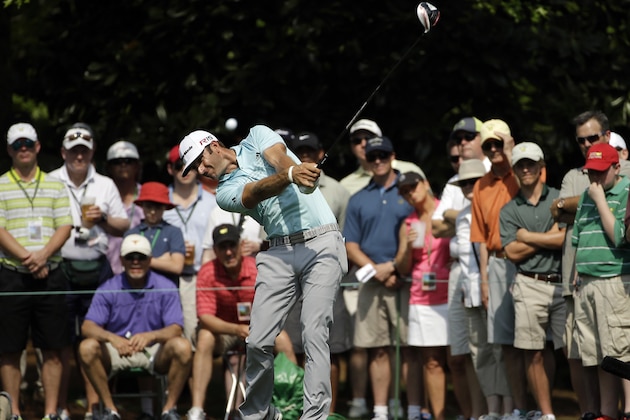 Dustin Johnson tees off on the seventh hole during the first round of the Masters golf tournament Thursday, April 9, 2015, in Augusta, Ga. (AP Photo/Matt Slocum)