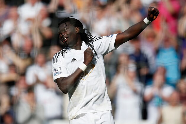 SWANSEA, WALES - APRIL 04:  Bafetimbi Gomis of Swansea City celebrates his second goal during the Barclays Premier League match between Swansea City and Hull City at Liberty Stadium on April 4, 2015 in Swansea, Wales.  (Photo by Steve Bardens/Getty Images)