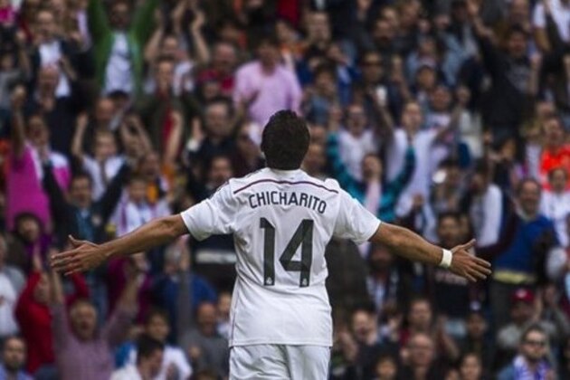 Real Madrid's Chicharito, celebrates his goal during a Spanish La Liga soccer match between Real Madrid and Eibar at the Santiago Bernabeu stadium in Madrid, Spain, Saturday, April 11, 2015. (AP Photo/Andres Kudacki)