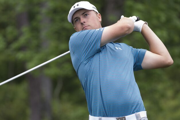 Jordan Spieth watches his tee shot on the 13th hole in the final round of the Houston Open golf tournament Sunday, April 5, 2015,  in Humble, Texas. (AP Photo/George Bridges)