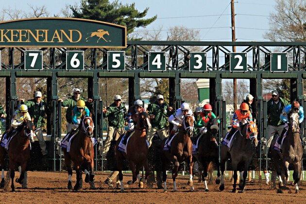 Eventual winner Carpe Diem, fourth from left, ridden by jockey John Velazquez, clears  the starting gate to begin the 91st running of the Blue Grass Stakes horse race at Keeneland Race Course in Lexington, Ky., Saturday, April. 4, 2015. Danzig Moon, far left ridden by jockey Julien Leparoux, was second. (AP Photo/Garry Jones)