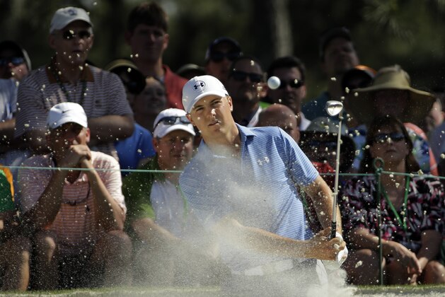 Jordan Spieth watches his hit out of a bunker at the seventh hole during the third round of the Masters golf tournament Saturday, April 11, 2015, in Augusta, Ga. (AP Photo/David J. Phillip)