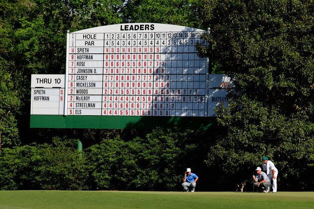 AUGUSTA, GA - APRIL 11:  Jordan Spieth of the United States and Charley Hoffman of the United States line up putts on the 11th green during the third round of the 2015 Masters Tournament at Augusta National Golf Club on April 11, 2015 in Augusta, Georgia.  (Photo by Jamie Squire/Getty Images)