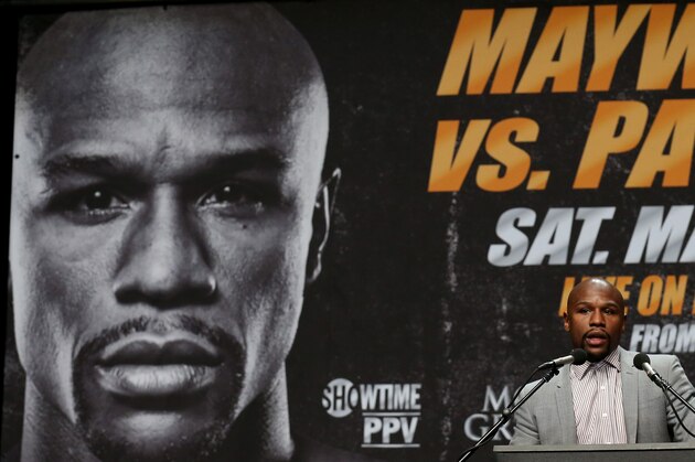 LOS ANGELES, CA - MARCH 11:  Floyd Mayweather Jr. speaks at the  Floyd Mayweather v Manny Pacquiao  Press Conference on March 11, 2015 in Los Angeles, California.  (Photo by Stephen Dunn/Getty Images)