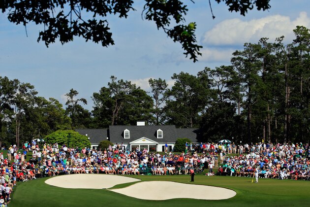 AUGUSTA, GA - APRIL 11:  Phil Mickelson of the United States putts on the ninth green as a gallery of patrons look on during the third round of the 2015 Masters Tournament at Augusta National Golf Club on April 11, 2015 in Augusta, Georgia.  (Photo by Jamie Squire/Getty Images)