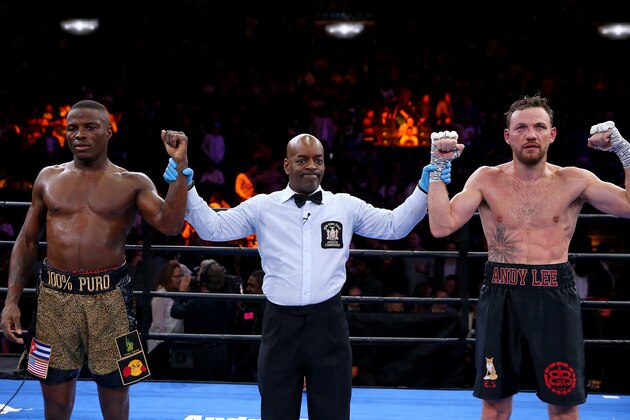 NEW YORK, NY - APRIL 11:  Peter Quillin and Andy Lee stand with the referee as it is declared a draw in their Premier Boxing Champions Middleweight bout at Barclays Center on April 11, 2015 in the Brooklyn borough of New York City.  (Photo by Elsa/Getty Images)