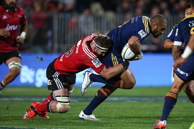 CHRISTCHURCH, NEW ZEALAND - APRIL 11: Patrick Osborne of the Highlanders
is tackled by Kieran Read of the Crusaders during the round nine Super Rugby match between the Crusaders and the Highlanders at AMI Stadium on April 11, 2015 in Christchurch, New Zealand.  (Photo by Martin Hunter/Getty Images)