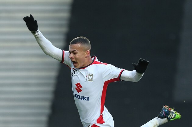 MILTON KEYNES, ENGLAND - DECEMBER 06: Georg Margreitter of Chesterfield clears the ball from Dele Alli of MK Dons during the FA Cup Second Round match between MK Dons and Chesterfield at Stadium mk on December 6, 2014 in Milton Keynes, England.  (Photo by Pete Norton/Getty Images)