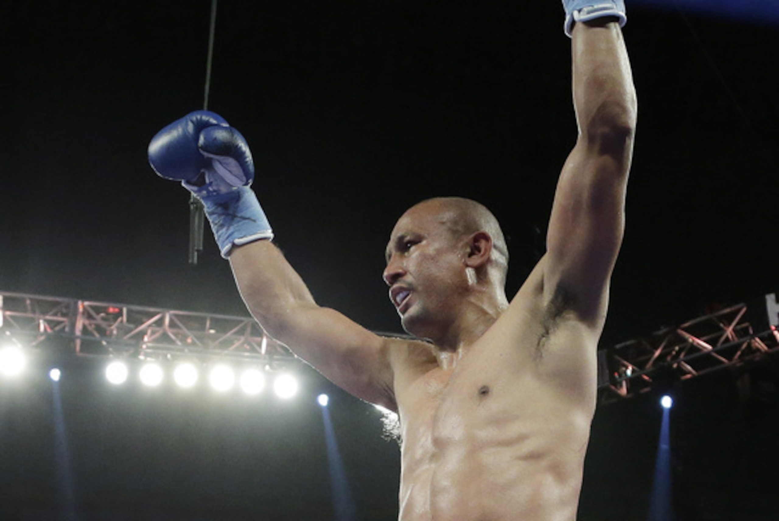 Orlando Salido celebrates his win over Vasyl Lomachenko in a 12-round featherweight title bout on Saturday, March 1, 2014, in San Antonio. Salido won by split decision. (AP Photo/Eric Gay)