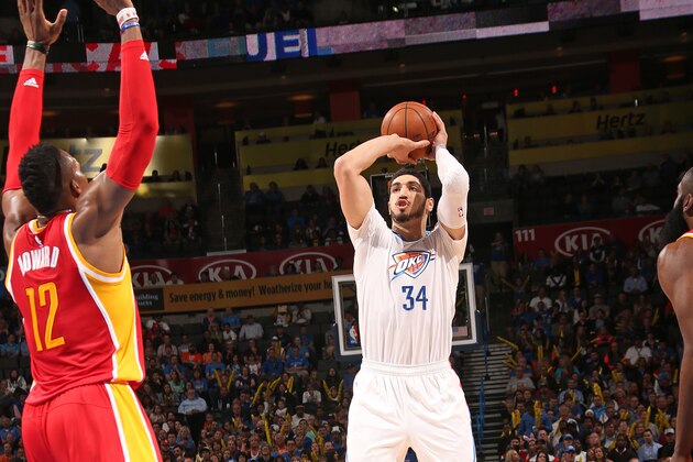 OKLAHOMA CITY, OK- APRIL 5:  Enes Kanter #34 of the Oklahoma City Thunder shoots the ball against the Houston Rockets on April 5, 2015 at Chesapeake Energy Arena in Oklahoma City, Oklahoma. NOTE TO USER: User expressly acknowledges and agrees that, by downloading and or using this photograph, User is consenting to the terms and conditions of the Getty Images License Agreement. Mandatory Copyright Notice: Copyright 2015 NBAE (Photo by Layne Murdoch/NBAE via Getty Images)