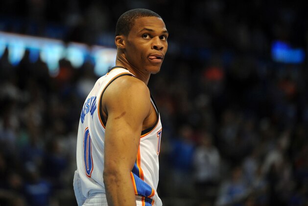 Apr 10, 2015; Oklahoma City, OK, USA; Oklahoma City Thunder guard Russell Westbrook (0) looks into the crowd during action against the Sacramento Kings during the first quarter at Chesapeake Energy Arena. Mandatory Credit: Mark D. Smith-USA TODAY Sports