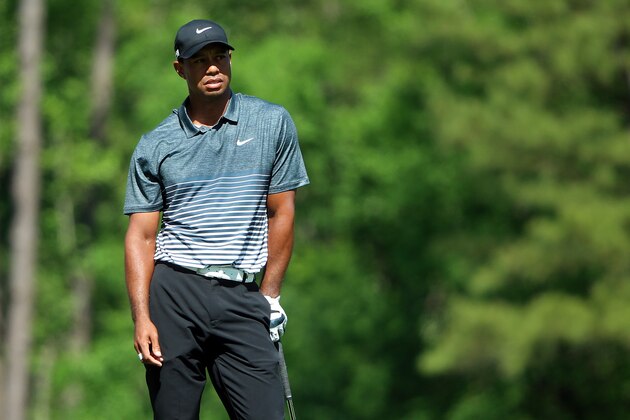 AUGUSTA, GA - APRIL 11:  Tiger Woods of the United States reacts to his tee shot on the 12th hole during the third round of the 2015 Masters Tournament at Augusta National Golf Club on April 11, 2015 in Augusta, Georgia.  (Photo by Andrew Redington/Getty Images)