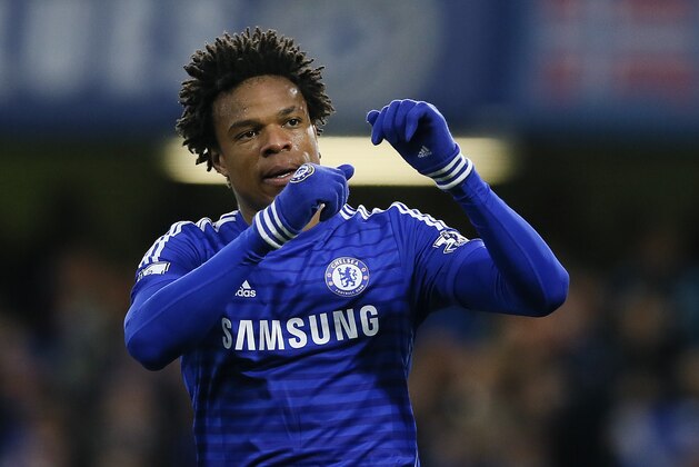 Chelsea's  Loic Remy celebrates scoring a goal during the English Premier League soccer match between Chelsea and Stoke City at Stamford Bridge stadium in London, Saturday, April 4, 2015. (AP Photo/Kirsty Wigglesworth)
