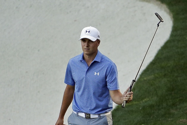 Jordan Spieth acknowledges applause after a birdie on the 13th green during the third round of the Masters golf tournament Saturday, April 11, 2015, in Augusta, Ga. (AP Photo/Charlie Riedel)