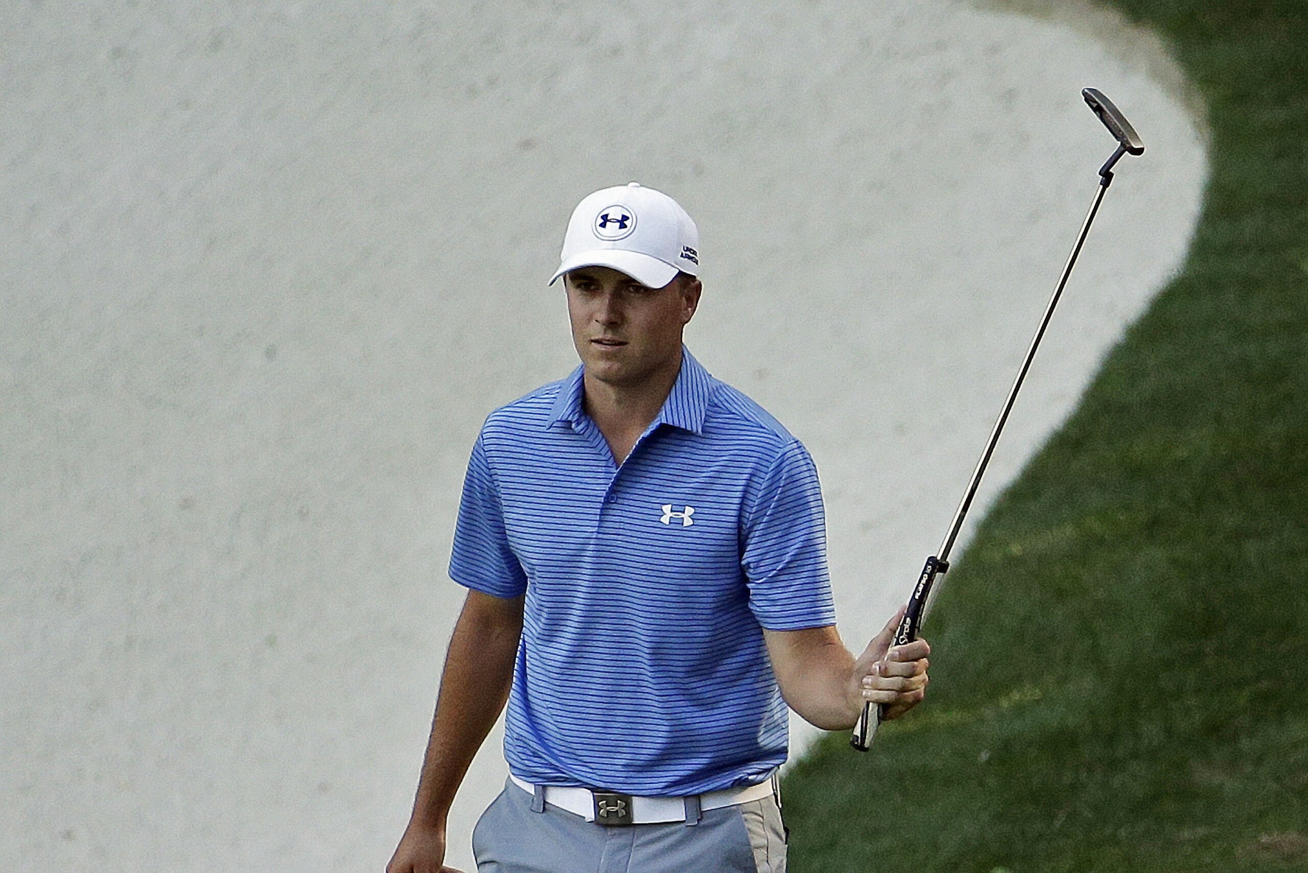 Jordan Spieth acknowledges applause after a birdie on the 13th green during the third round of the Masters golf tournament Saturday, April 11, 2015, in Augusta, Ga. (AP Photo/Charlie Riedel)