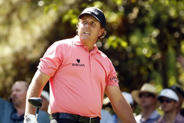 Apr 11, 2015; Augusta, GA, USA; Phil Mickelson reacts after his tee shot on the 7th hole during the third round of The Masters golf tournament at Augusta National Golf Club. Mandatory Credit: Rob Schumacher-USA TODAY Sports