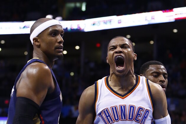 Oklahoma City Thunder guard Russell Westbrook (0) reacts after scoring against the New Orleans Pelicans as New Orleans Pelicans forward Dante Cunningham (44) looks on during the second quarter of an NBA basketball game in Oklahoma City, Friday, Feb. 6, 2015.  (AP Photo/Alonzo Adams)
