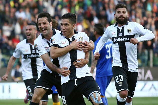 Parma's Jose Mauri, second from right, celebrates after scoring during a Serie A soccer match between Parma and Juventus, at Parma's Tardini stadium Saturday, April 11, 2015. Parma pulled off the shock of the season on Saturday as the crisis-hit club beat runaway leader Juventus 1-0 in Serie A. (AP Photo/Serena Campanini, Ansa)