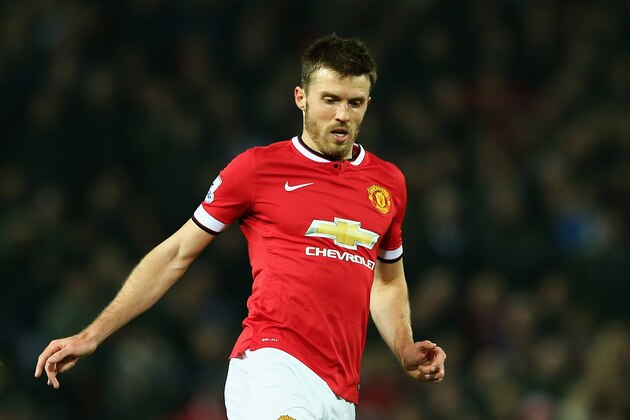 MANCHESTER, ENGLAND - NOVEMBER 29:  Michael Carrick of Manchester United in action during the Barclays Premier League match between Manchester United and Hull City at Old Trafford on November 29, 2014 in Manchester, England.  (Photo by Matthew Lewis/Getty Images)