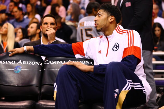 Mar 19, 2015; Phoenix, AZ, USA; New Orleans Pelicans forward Anthony Davis  sits on the bench in the second half against the Phoenix Suns at US Airways Center. The Suns defeated the Pelicans 74-72. Mandatory Credit: Mark J. Rebilas-USA TODAY Sports