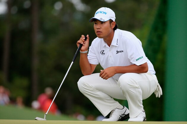 AUGUSTA, GA - APRIL 12:  Hideki Matsuyama of Japan lines up a putt on the 18th green during the final round of the 2015 Masters Tournament at Augusta National Golf Club on April 12, 2015 in Augusta, Georgia.  (Photo by Jamie Squire/Getty Images)