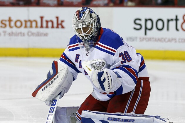 New York Rangers goalie Henrik Lundqvist (30), from Sweden, warms up before an NHL hockey game against the Washington Capitals, Saturday, April 11, 2015, in Washington. (AP Photo/Alex Brandon)