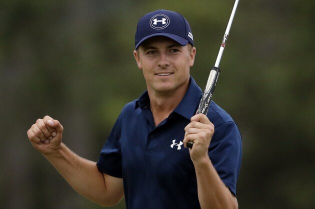 Jordan Spieth celebrates after winning the Masters golf tournament Sunday, April 12, 2015, in Augusta, Ga. (AP Photo/Chris Carlson)