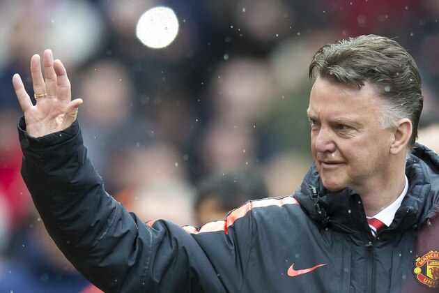 Manchester United's manager Louis van Gaal takes to the touchline before his team's English Premier League soccer match between Manchester United and Manchester City at Old Trafford Stadium, Manchester, England, Sunday, April 12, 2015. (AP Photo/Jon Super)