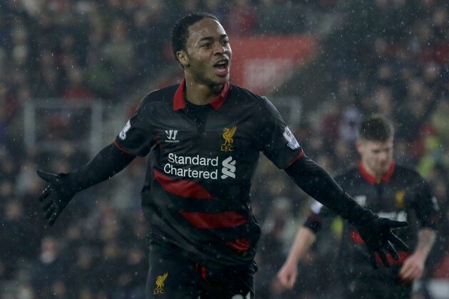 Liverpool’s Raheem Sterling celebrates after scoring a goal during the English Premier League soccer match between Southampton and Liverpool at St Mary's Stadium, Southampton, England, Sunday, Feb. 22, 2015. (AP Photo/Tim Ireland)