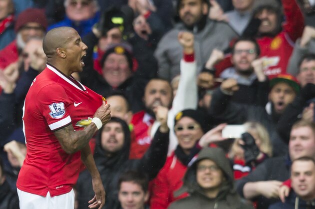 Manchester United's Ashley Young celebrates after scoring during the English Premier League soccer match between Manchester United and Manchester City at Old Trafford Stadium, Manchester, England, Sunday, April 12, 2015. (AP Photo/Jon Super)