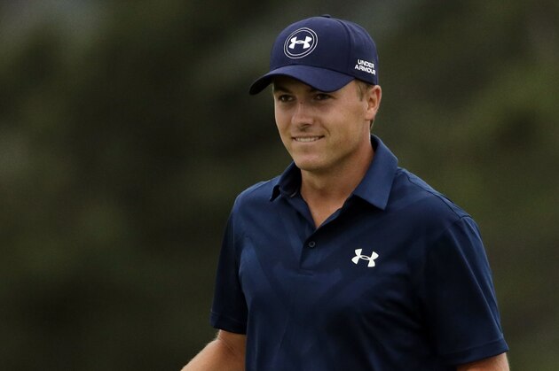 Jordan Spieth celebrates after winning the Masters golf tournament Sunday, April 12, 2015, in Augusta, Ga. (AP Photo/Chris Carlson)