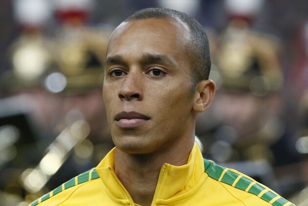 Brazil’s Miranda, stands for the national athem prior to the international friendly soccer match between France and Brazil at the Stade de France, north of Paris, France, Thursday, March 26, 2015. (AP Photo/Michel Euler)
