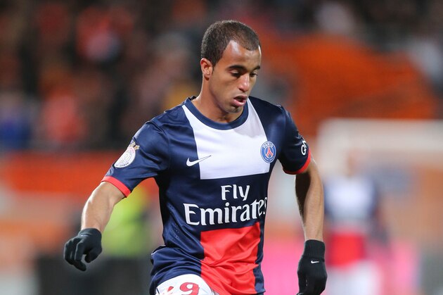 Paris Saint Germain's forward Lucas Moura of Brazil runs with the ball during his French League one soccer match, in Lorient, Friday, March 21, 2014. Paris won 1-0.(AP Photo/David Vincent)