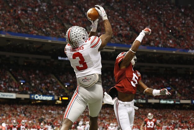 Jan 1, 2015; New Orleans, LA, USA; Ohio State Buckeyes receiver Michael Thomas (3) catches a second quarter touchdown pass against Alabama Crimson Tide cornerback Cyrus Jones (5) in the 2015 Sugar Bowl at Mercedes-Benz Superdome. Mandatory Credit: Matthew Emmons-USA TODAY Sports